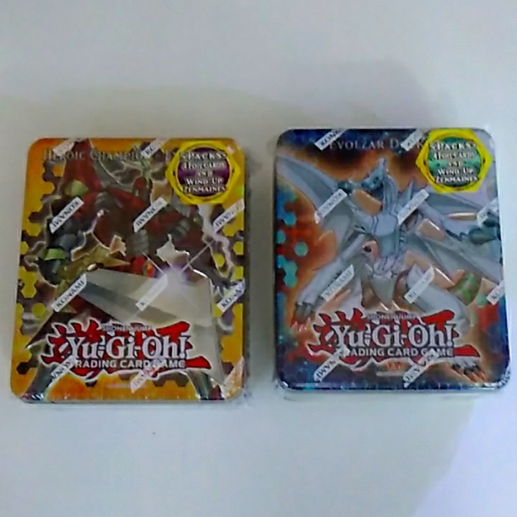 YUGIOH 2012 Set of 2 tins Evolzar Dolkka & Heroic Champion Excalibur Tin SEALED!